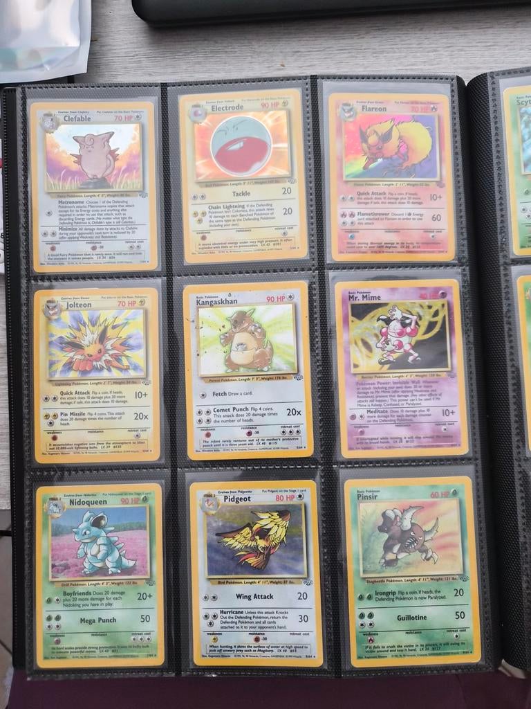 Complete jungle set engels 64/64, Ophalen of Verzenden, Gebruikt, Meerdere kaarten, Foil
