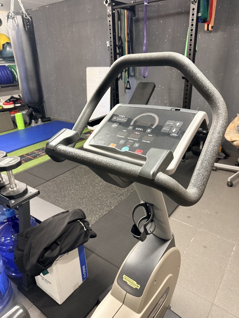 Technogym fiets (hometrainer), Sport en Fitness, Ophalen, Overige materialen, Gebruikt, Benen