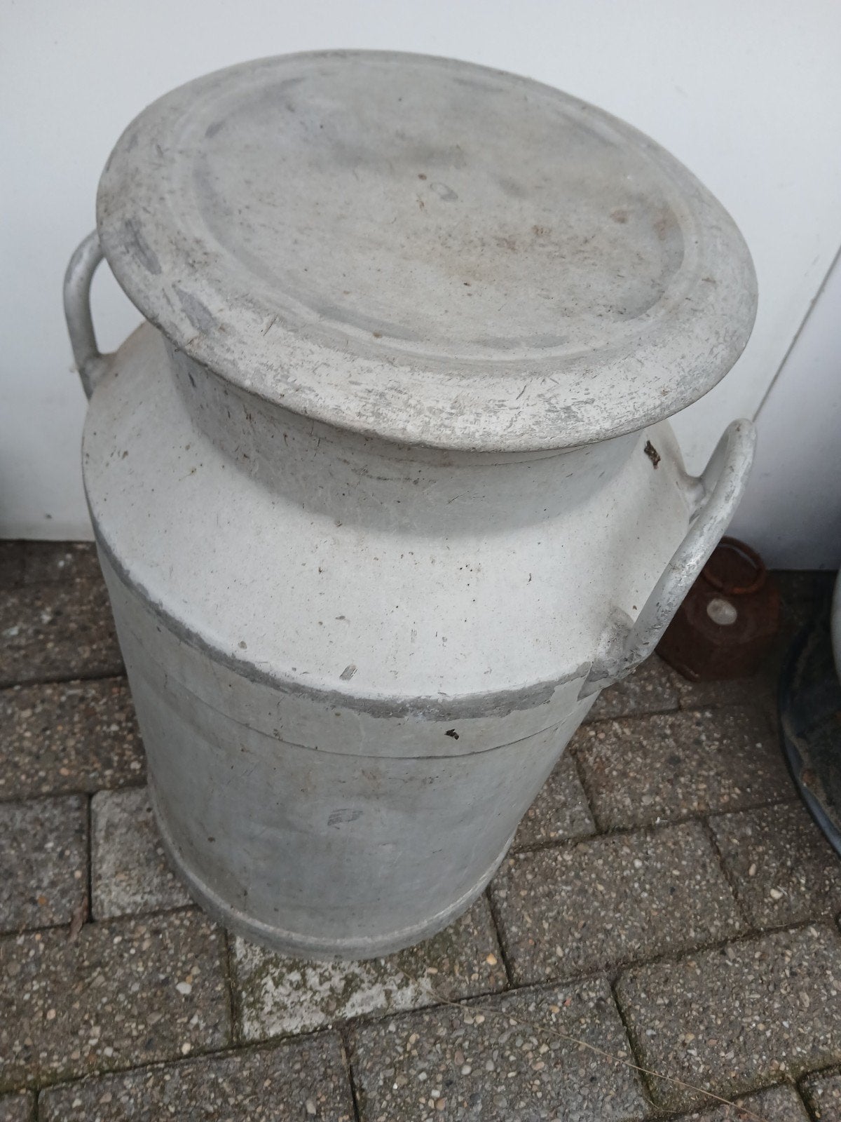 melkkruik aluminium, Ophalen
