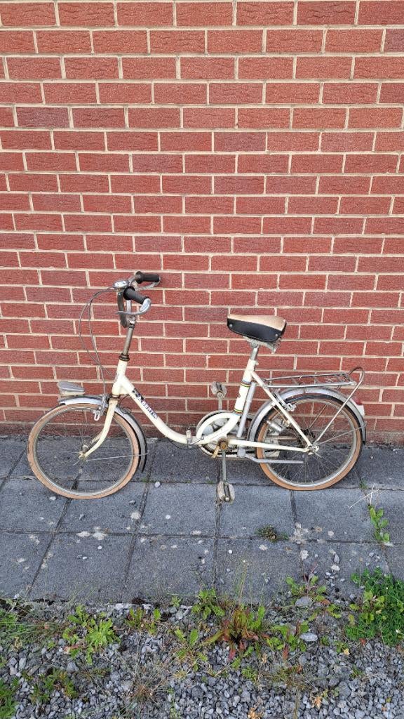 Vintage opvouwbare fiets, Ophalen