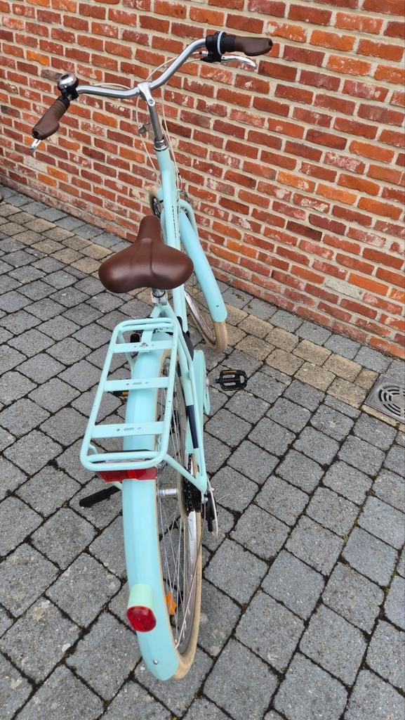 Damesfiets, Ophalen
