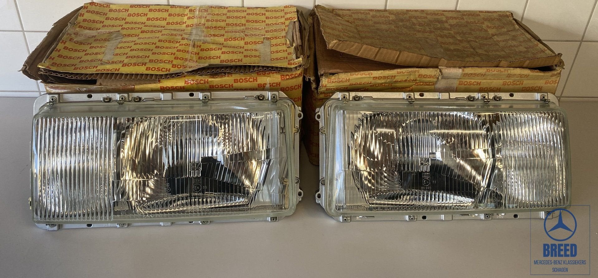 NOS koplamp L+R Bosch H4 voor Mercedes-Benz W116, -, Nieuw, Ophalen of Verzenden, -