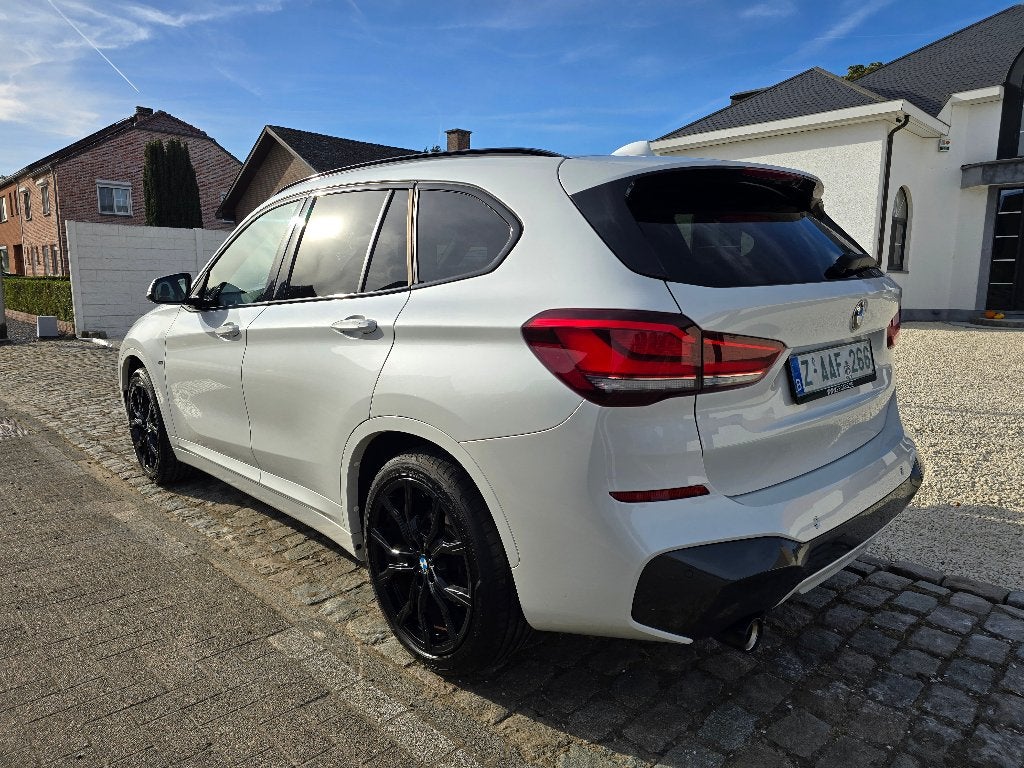 BMW X1 sDrive18i -M Pack- Automaat - Carplay - Parelmoer wit, Autos, X1, Achat, Entreprise, Carnet d'entretien
