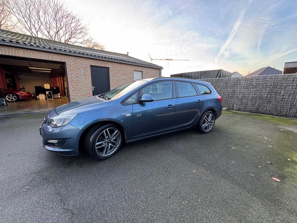 Opel Astra 1.3 eco flex 2013, Voorwielaandrijving, Euro 5, Stof, Zwart
