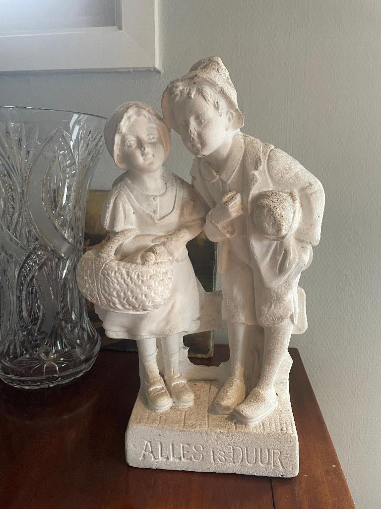 statue "Alles is duur", Ophalen
