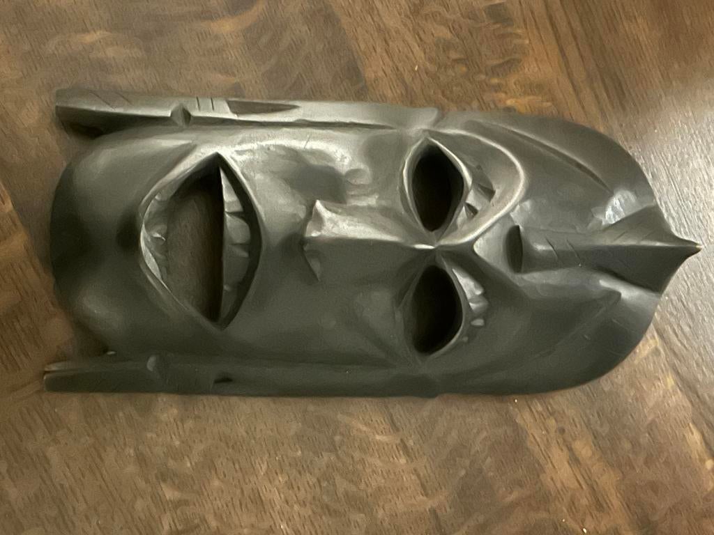 Afrikaans masker hout, Ophalen