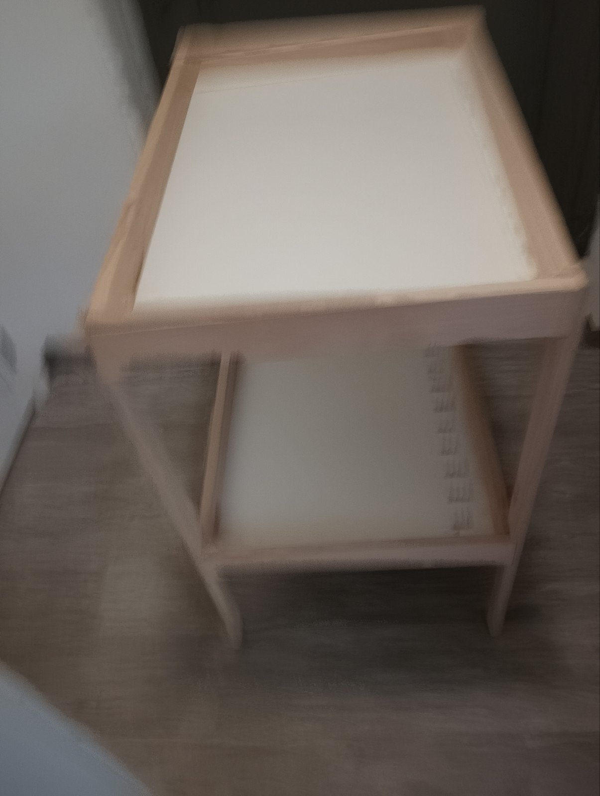 Ikea verzorgingstafel, Ophalen
