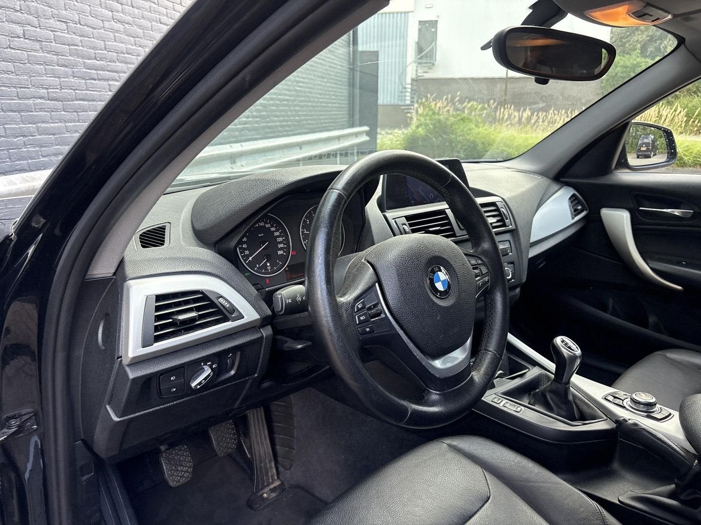 BMW 116 1-serie 116i Upgrade Edition | Dakota Leder | Airco, Auto's, BMW, 1 Reeks, Zwart, Bedrijf, Cruise Control