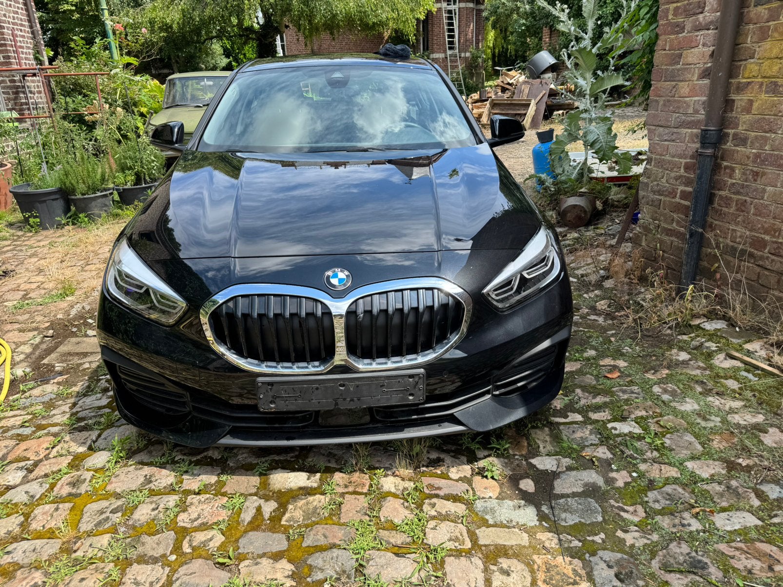 BMW116   21500km nieuwstaat, Auto's, Voorwielaandrijving, Zwart, 5 deurs, Particulier