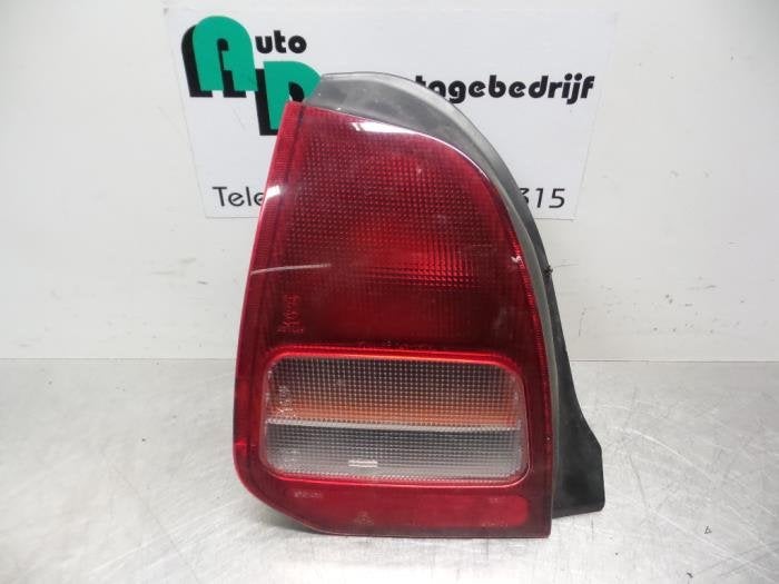 Achterlicht links van een Mitsubishi Colt (Colt 96-), Auto-onderdelen, Verlichting, Mitsubishi, Gebruikt, Ophalen of Verzenden