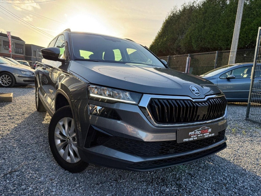 Skoda Karoq 1.0 TSI/ Maintenance + Keuring + 1 jaar garantie, Auto's, Voorwielaandrijving, Dealer onderhouden, Stof, Lederen bekleding