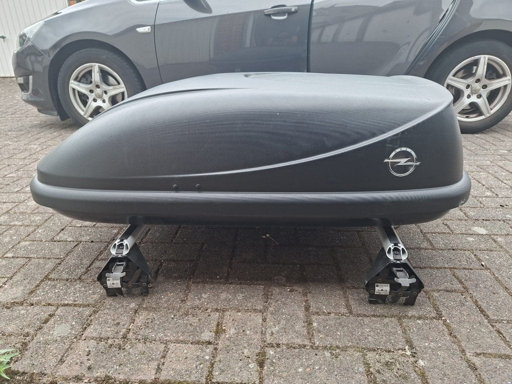 Dak koffer, Ophalen, Zo goed als nieuw