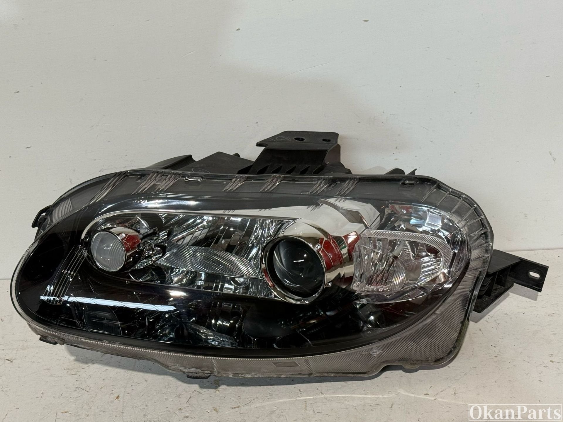 Phare gauche Mazda MX-5 NE99-51-0L0 100-61384, Utilisé
