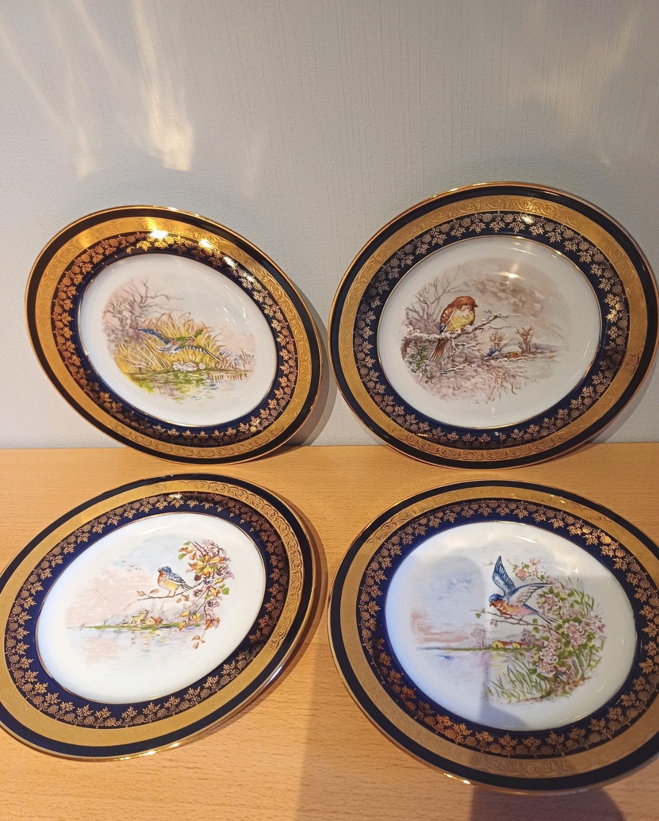 Set van 4 porseleinen sierborden, Huis en Inrichting, Ophalen, Goud