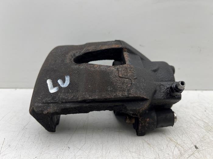 Etrier de frein (pince) avant gauche d'un Volkswagen UP, Volkswagen, -, 3 mois de garantie, Utilisé