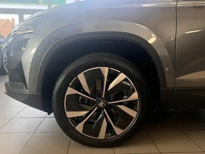 Skoda Karoq 1.5 TSI Corporate (automaat), Auto's, Automaat, 110 kW, Overige kleuren, Leder en Stof