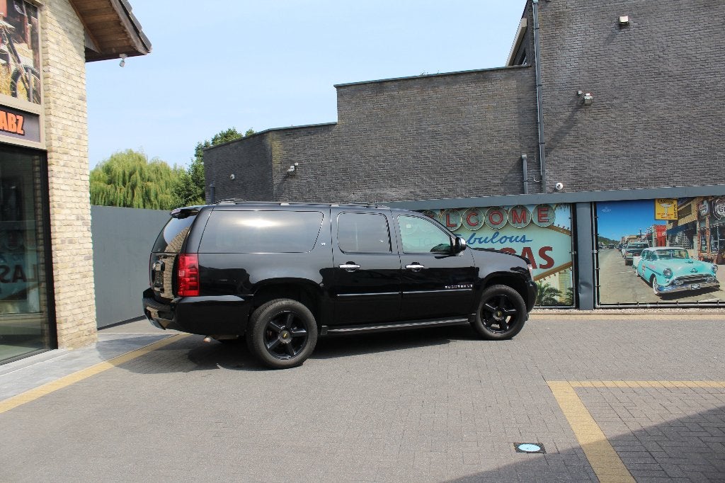 Chevrolet Suburban 5.3 i LPG, Auto's, Automaat, 238 kW, Zwart, Leder