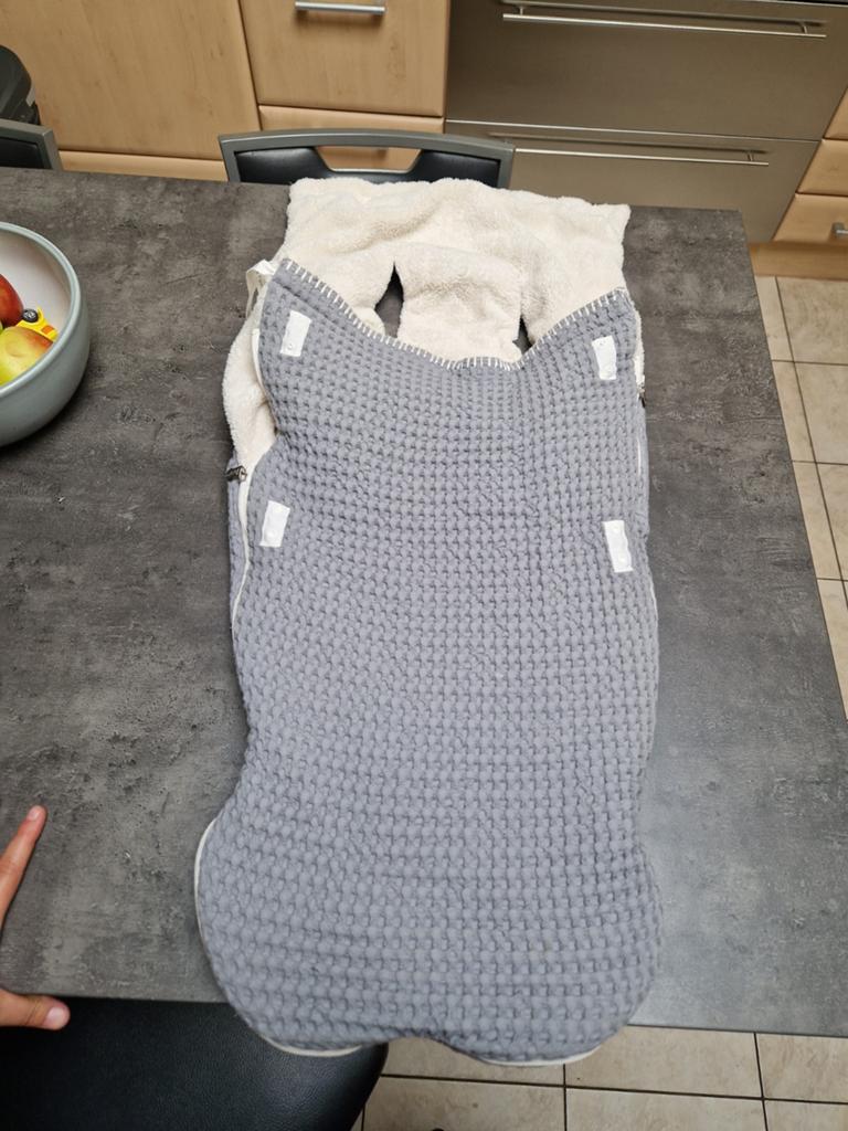 Voetzak van koeka buggy, Ophalen