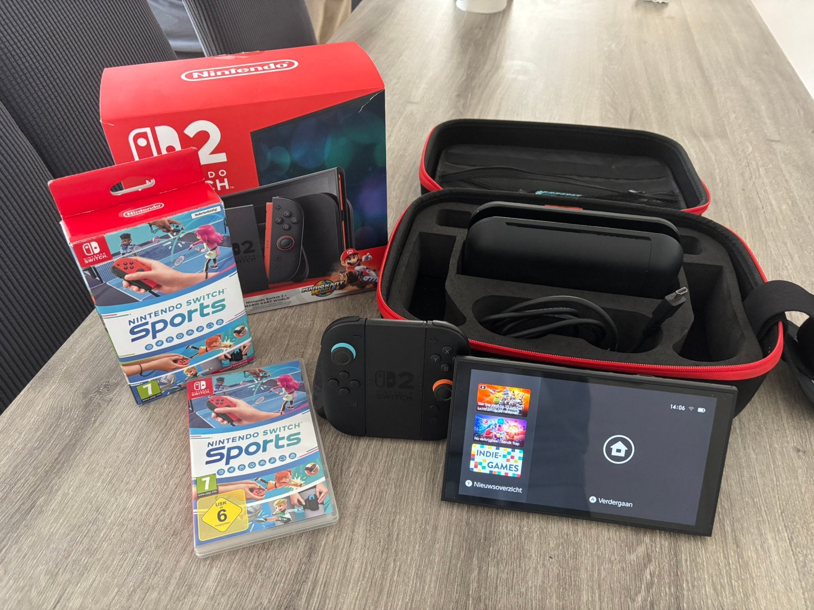 Nintendo switch 2 + Mario kart + nintendo sports + koffer, Enlèvement, Comme neuf
