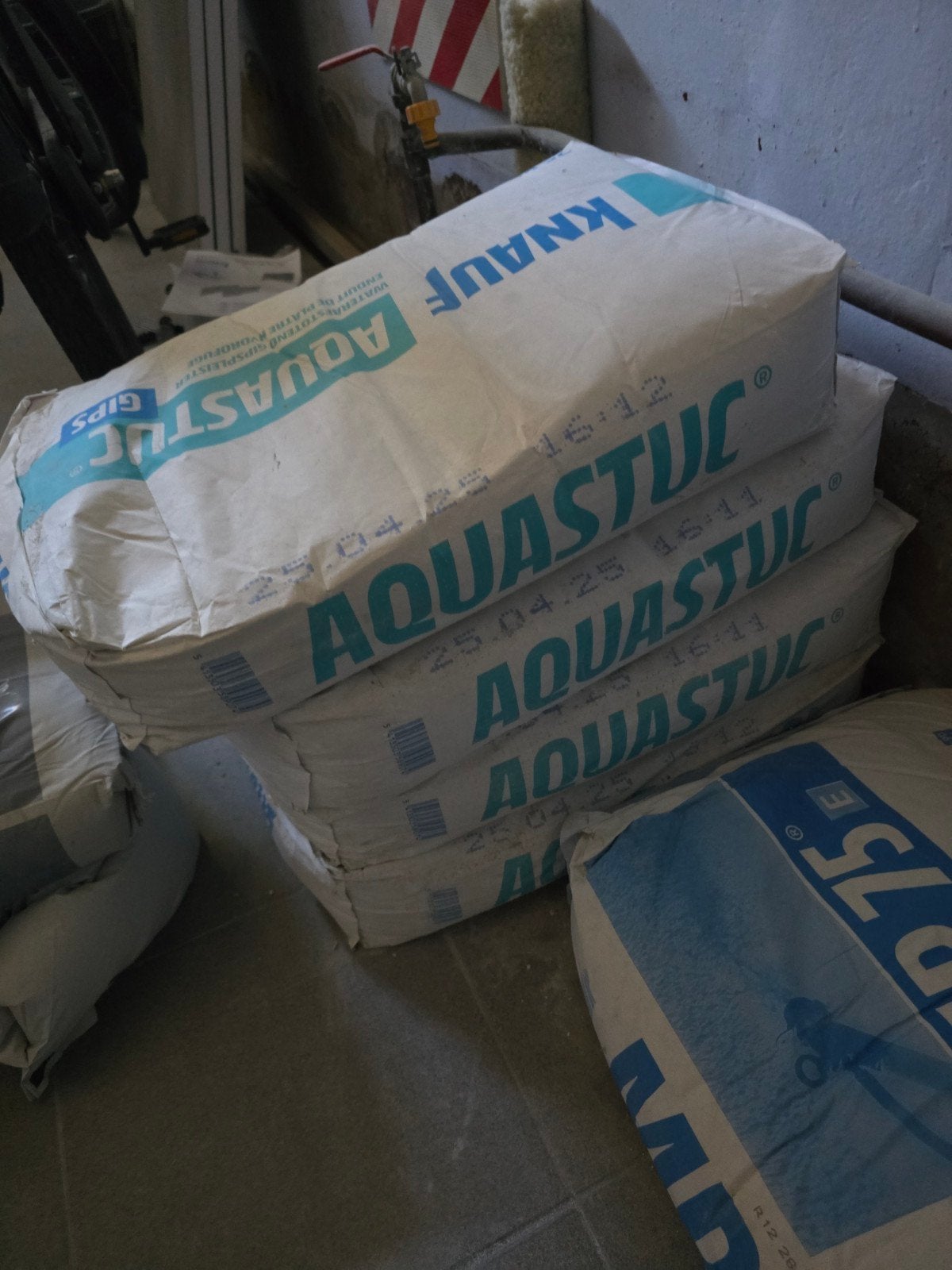 Knauf Aquastuc 4 zakken, Ophalen