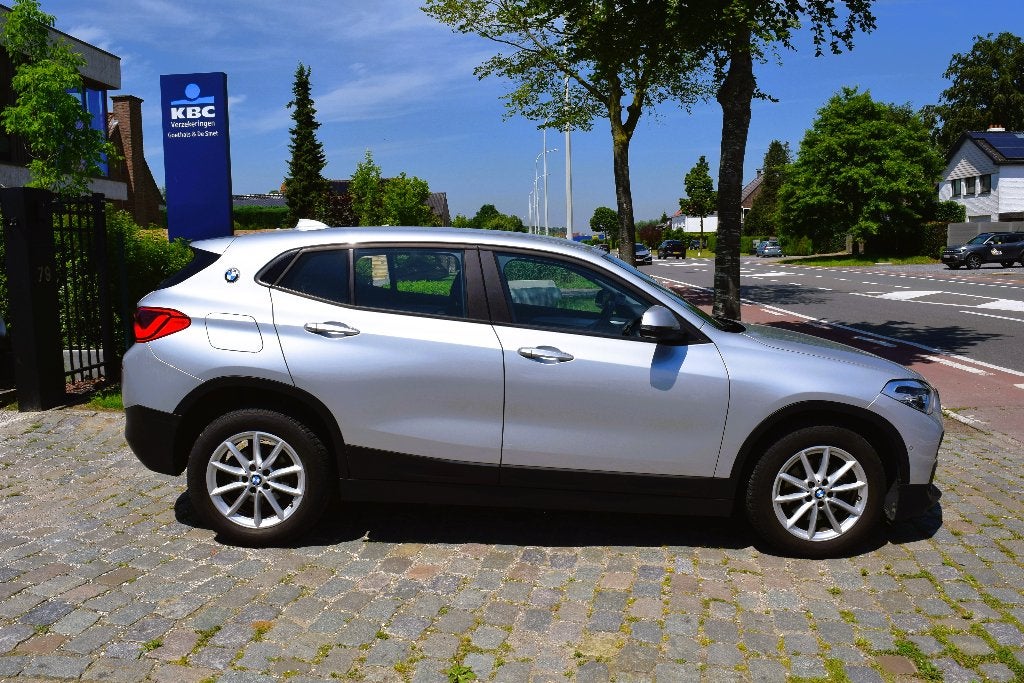 BMW X2 sDrive18i/Automaat/1st Owner/HISTORY/GARANTIE, Auto's, BMW, Bluetooth, 5 zetels, SUV of Terreinwagen, Zilver of Grijs