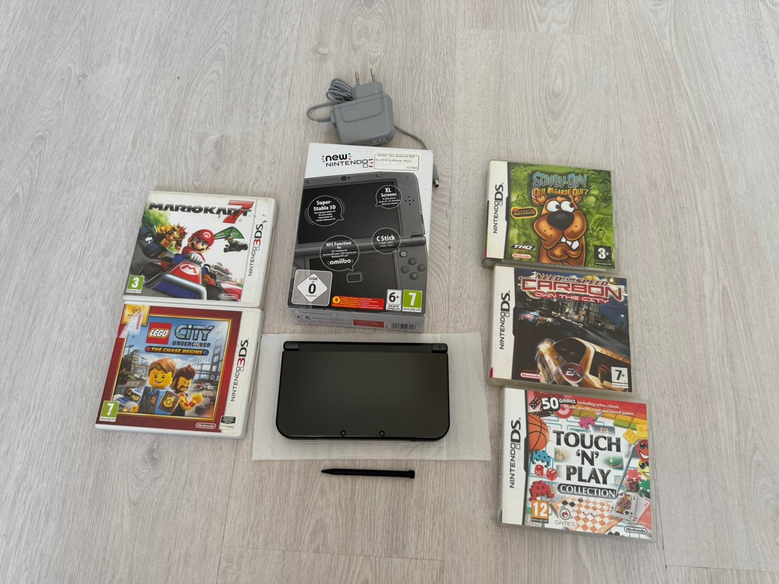 Nieuwe Nintendo 3ds XL gloednieuw in doos met 5 games, Ophalen, Met games, Zwart, Nieuw