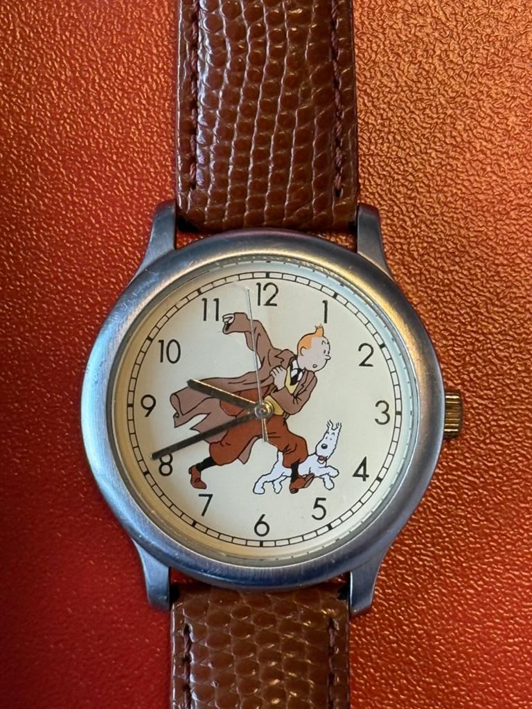 Montre Tintin Herge 1994 serie limitée Globe Trotteurs, Montre-bracelet, Autres marques, Cuir, Comme neuf