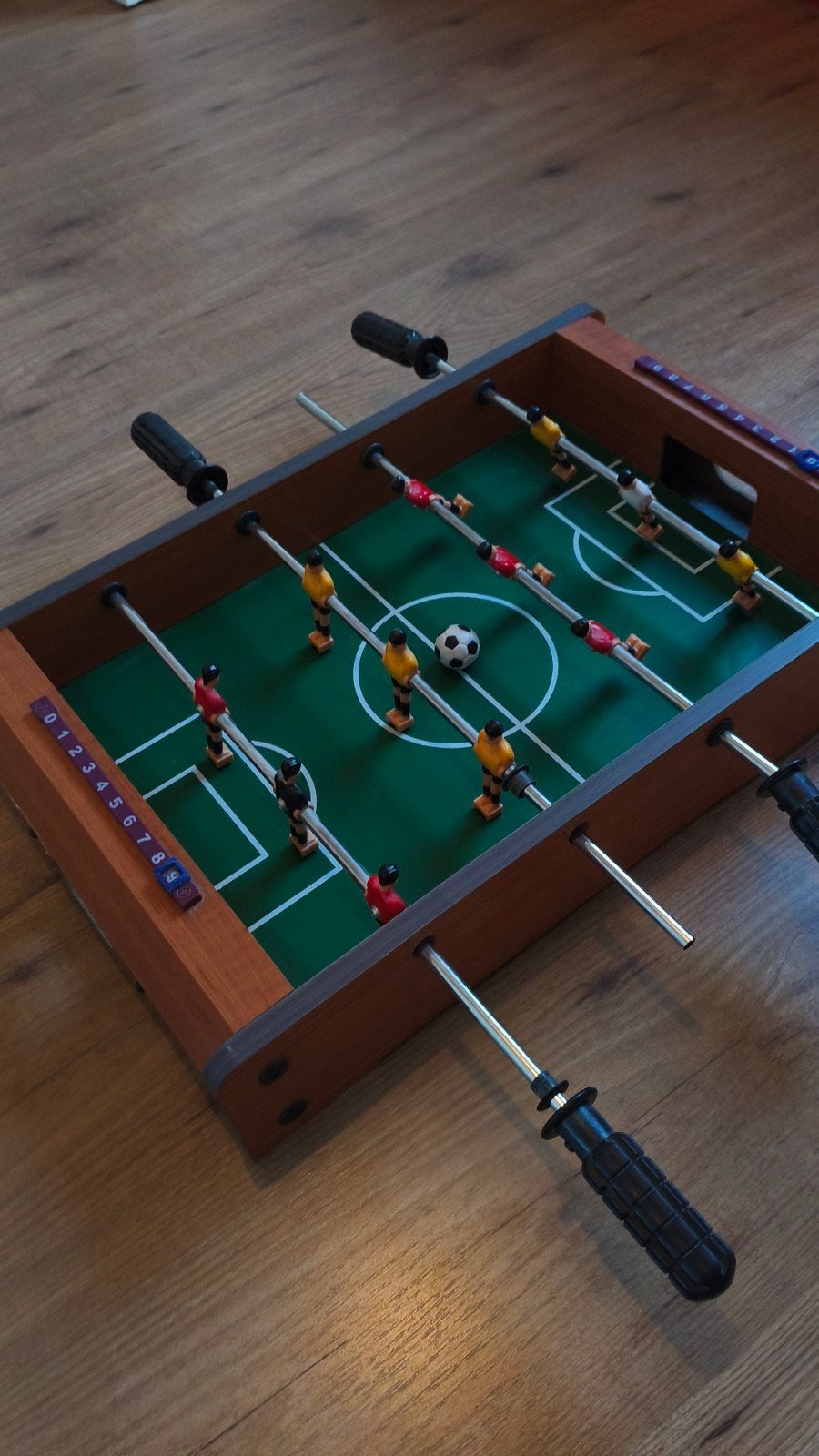 un jeu de foot manuel, Enlèvement