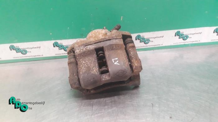 Etrier de frein (pince) avant gauche d'un Renault Twingo (Tw, Renault, -, 3 mois de garantie, Utilisé