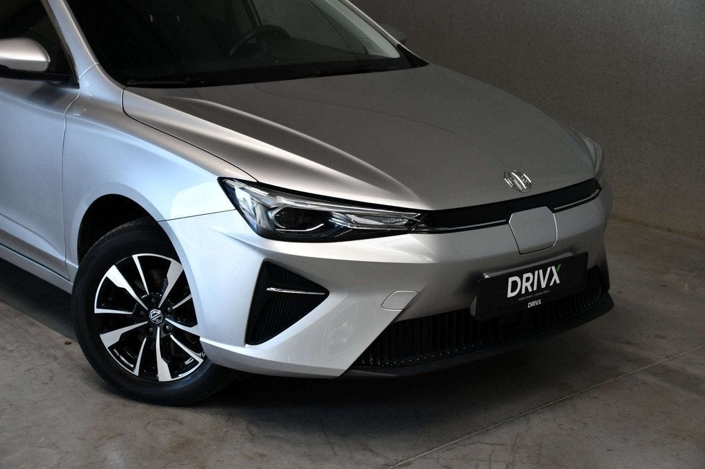 MG MG5 61 kWh l Long Range l Carplay l ACC l DAB l Zetelverw, Auto's, MG, Stof, Gebruikt, Zwart, https://public.car-pass.be/vhr/14a4902d-33e9-4a41-b8df-81b210389e6c
