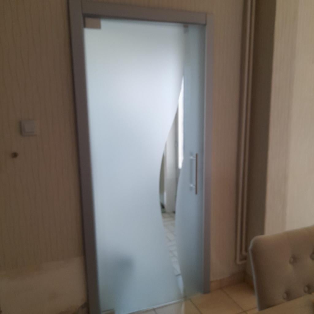 Een design glazen deur 200×81×0.80, Ophalen