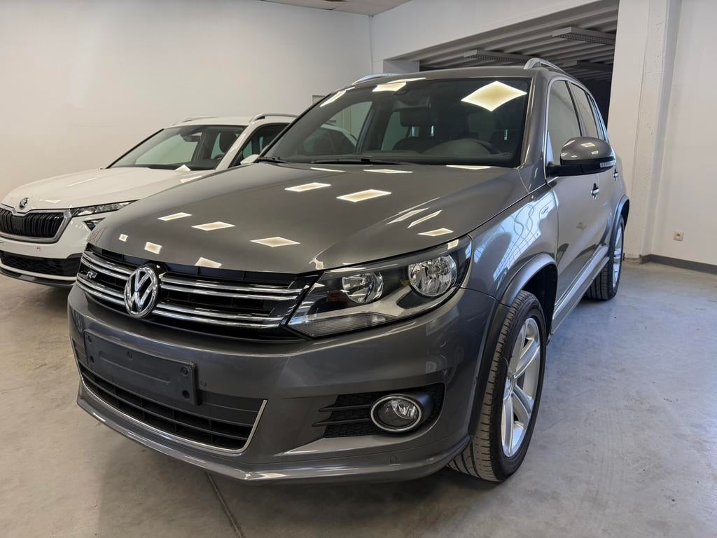 Volkswagen Tiguan 1.4 TSI Sport R-Line, Autos, Volkswagen, Cuir, Argent ou Gris, Achat, 1800 kg