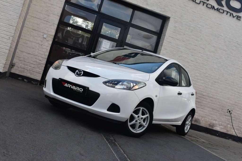 Mazda 2 1.3i Sport / Carplay / Topstaat / Airco / Garantie, Auto's, Mazda, Voorwielaandrijving, Stof, Zwart, 4 cilinders