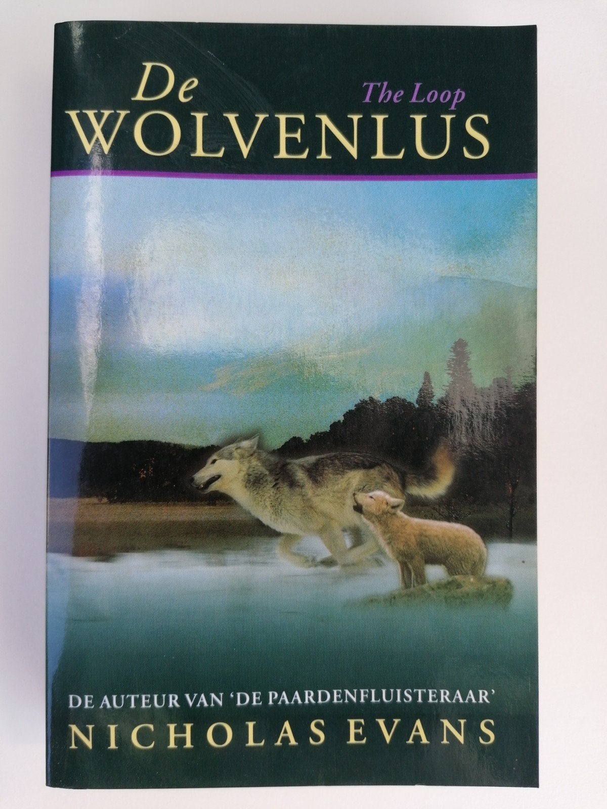 Nicholas Evans - De wolvenlus, Boeken, Gelezen, Ophalen of Verzenden, Nederland, Nicholas Evans