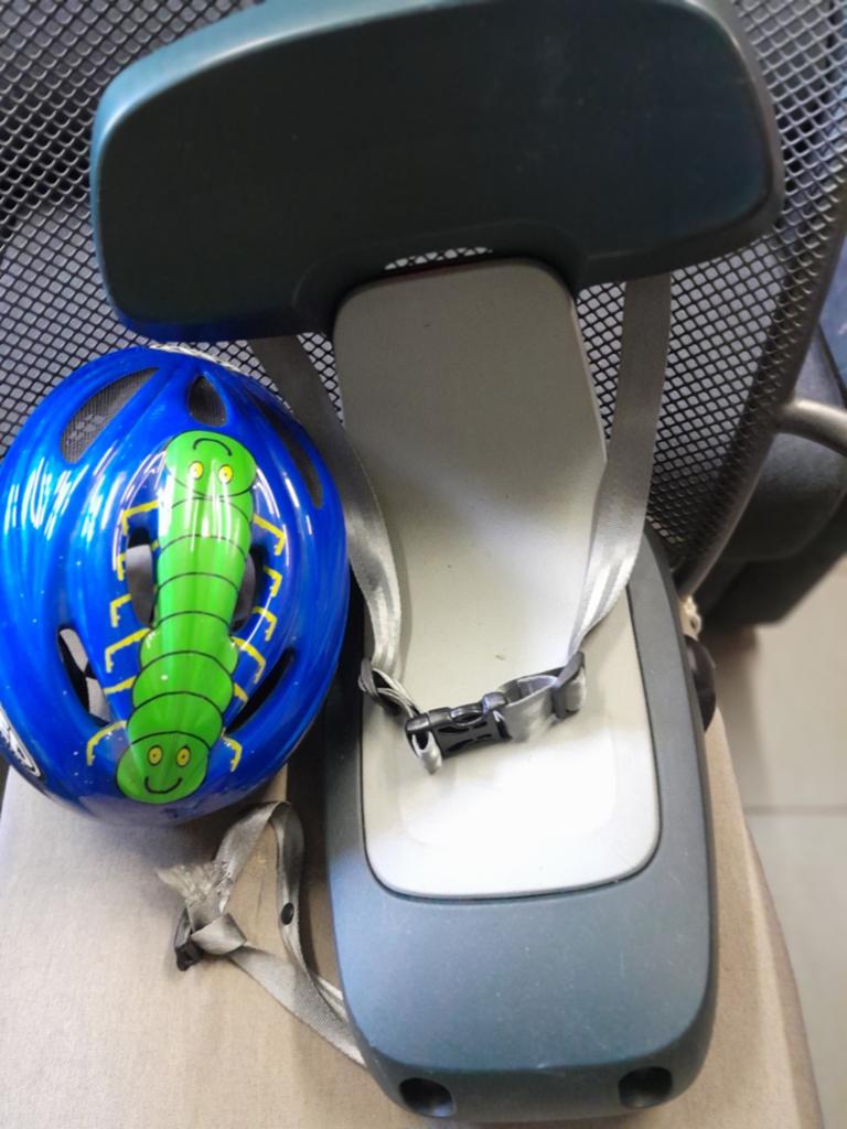 Kinderzitje voor op fiets, Ophalen