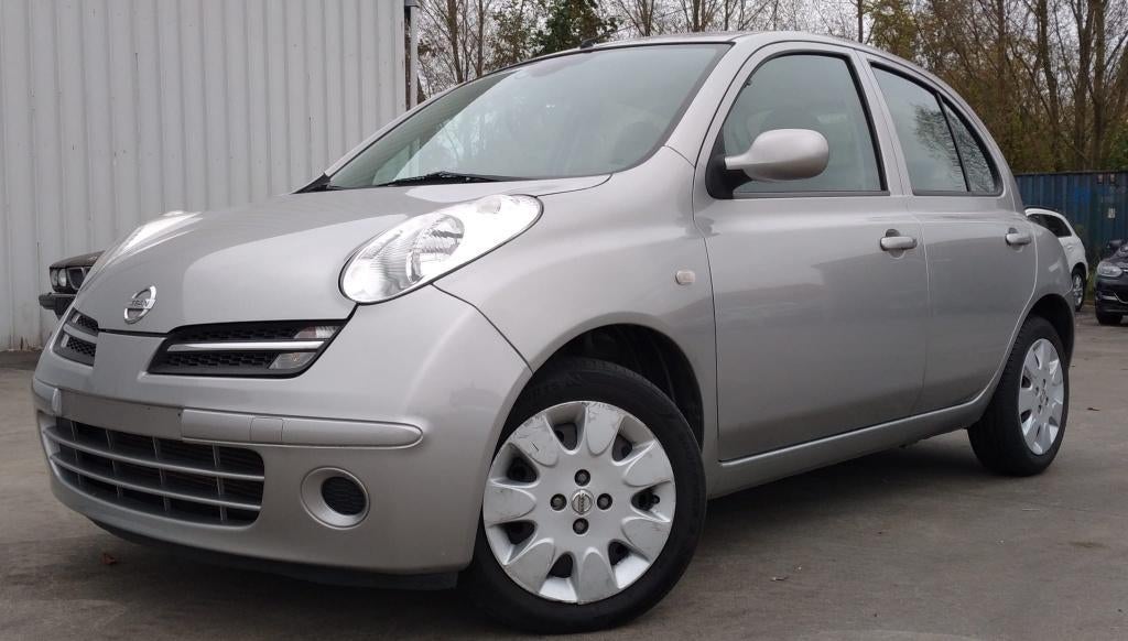 Nissan Micra 1.3 Benzine (Automaat), Elektrische buitenspiegels, Stof, Zwart, 4 cilinders