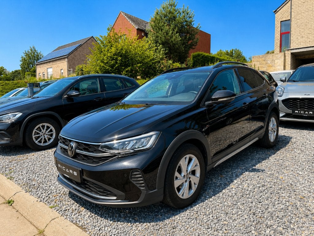 VW Taigo 1.0TSI DSG Camera Carplay Carnet LEZ 2035 GARANTIE, Auto's, Stof, Geheel digitaal combi-instrument, 4 cilinders, Zwart