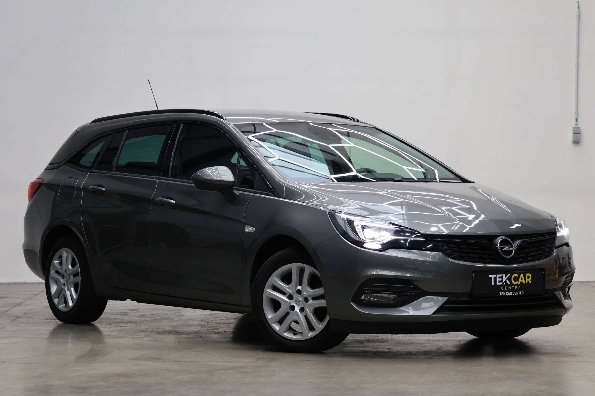 Opel Astra Sports Tourer 1.5D Automaat 12M Garantie, Autos, Argent ou Gris, Euro 6, Entreprise, Noir
