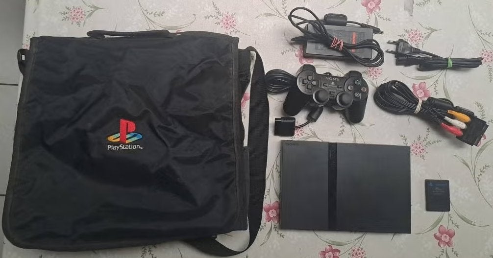 Playstation 2 slim, Gebruikt, Zwart, Met games, Ophalen of Verzenden