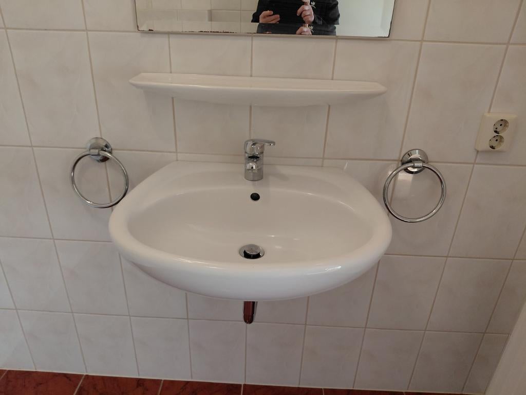 Wastafel met kraan, Ophalen