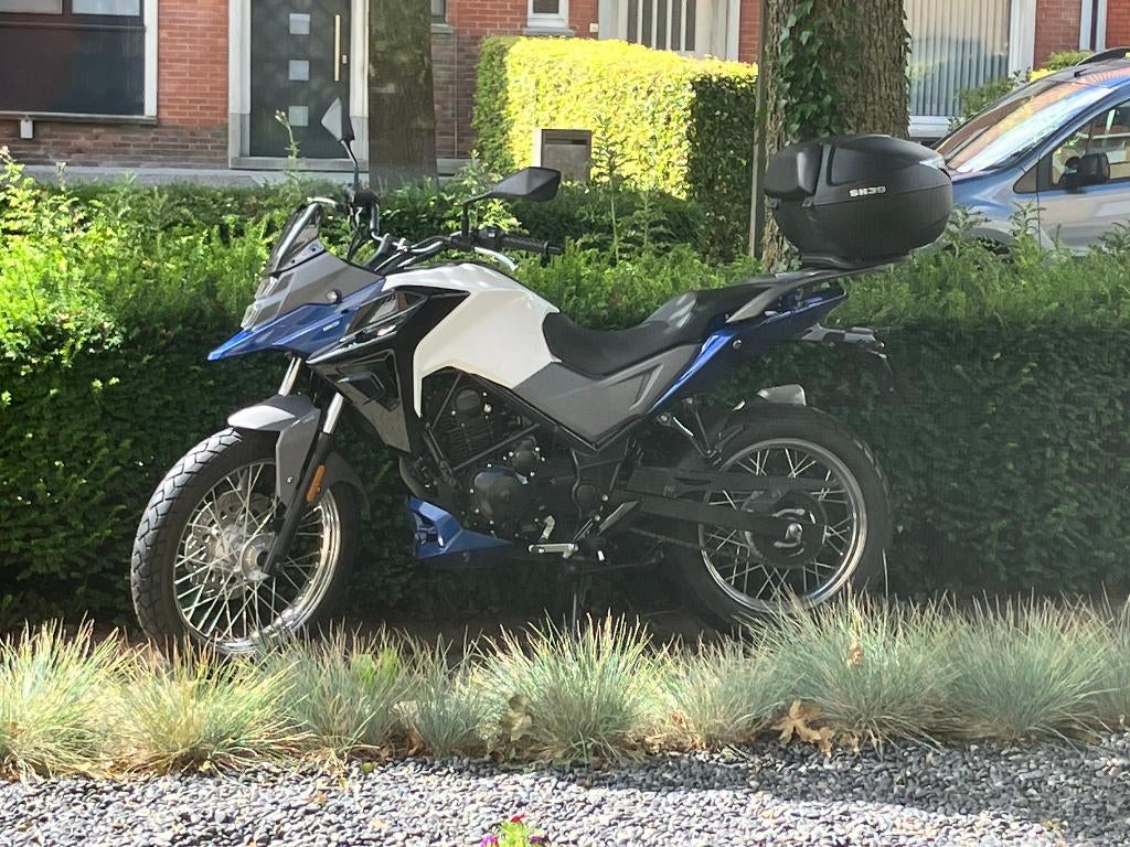 SYMNH T 125cc, Fietsen en Brommers, Scooters | Aprilia, Ophalen, 125 cc, Zo goed als nieuw, Benzine
