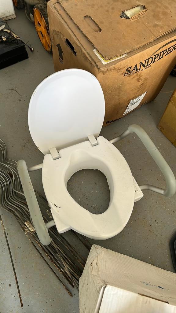 Rehausseur lunette de toilette, Ophalen