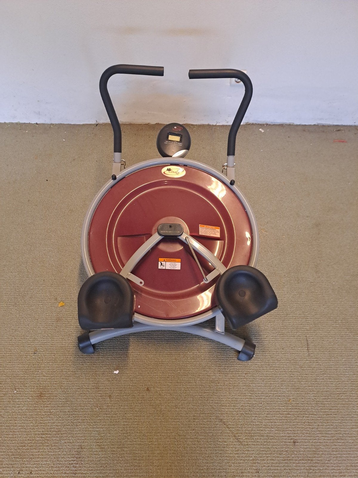 buikspiertrainer, Ophalen