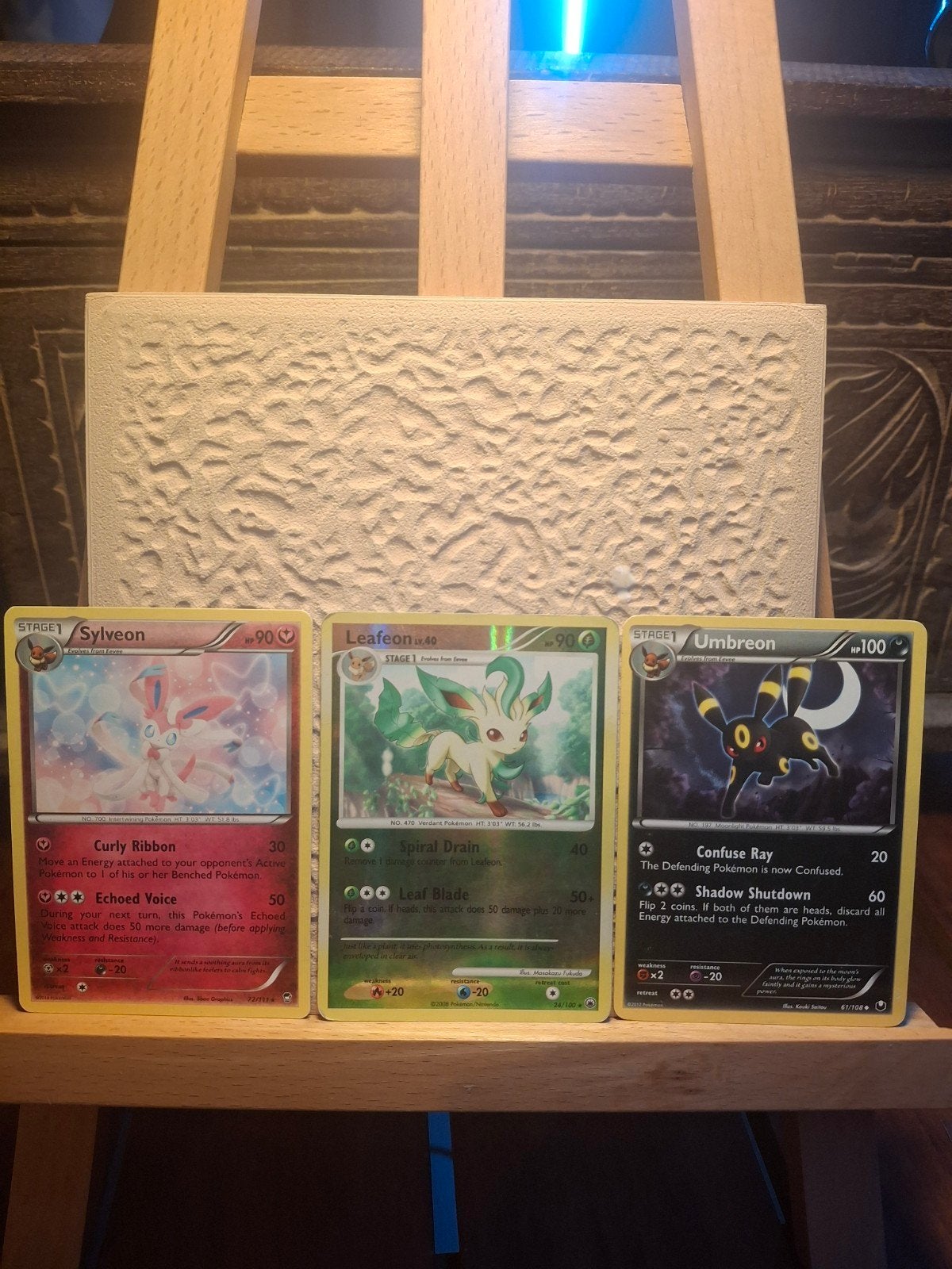 Sylveon, Leafeon (reverse holo), Umbreon, Ophalen, Zo goed als nieuw, Meerdere kaarten, Foil