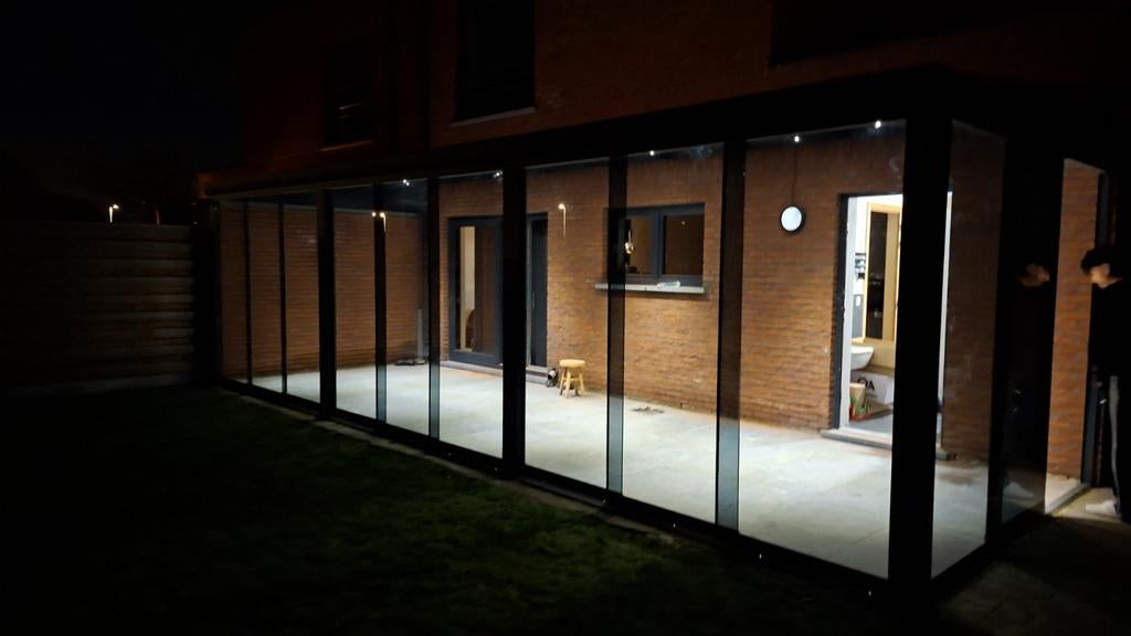 Terrasoverkapping glazen schuifwanden veranda carport pergol