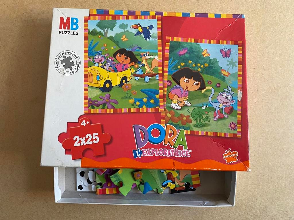 Puzzle (2 x 25 pièces) Dora (de MB puzzles), Enlèvement ou Envoi, 10 à 50 pièces, Comme neuf, 4 à 6 ans