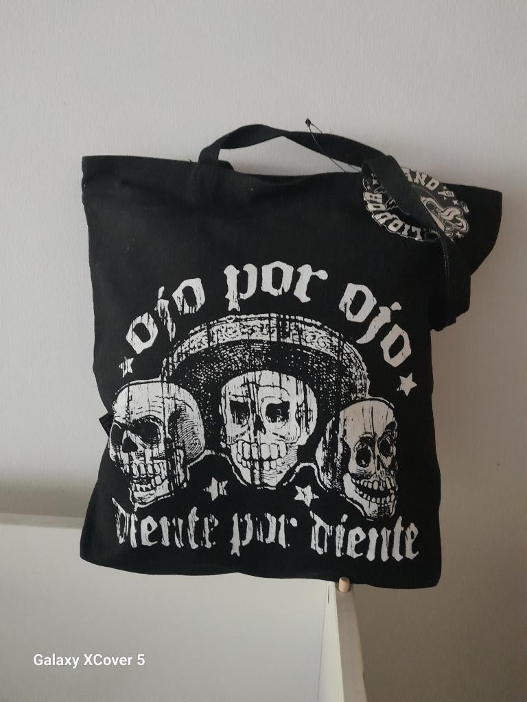 Liquorbrand bedrukte canvas draagtas 'ojo por ojo'    NIEUW, Handtassen en Accessoires, Ophalen of Verzenden, Nieuw, Zwart, Overige merken