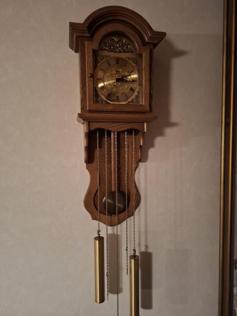 Wandklok met slinger, Ophalen