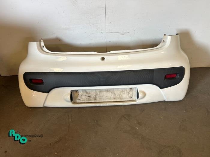 Pare-chocs arrière d'un Peugeot 107 (107 05-) (KWD), -, 3 mois de garantie, Utilisé, -