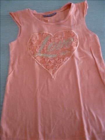 oranje topje maat 122 - 128, Kinderen en Baby's, Kinderkleding | Maat 122, Ophalen of Verzenden, Zo goed als nieuw, Meisje, Shirt of Longsleeve